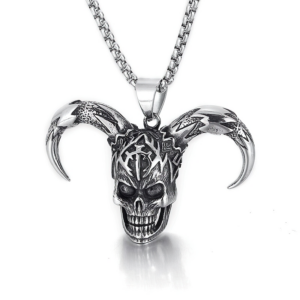 Horned skull pendant necklace frontal close-up view with intricate tribal carvings and vintage silver-toned metal finish