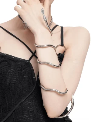Adjustable silver snake jewelry wrapped around torso showing side-wrap styling on black gothic camisole