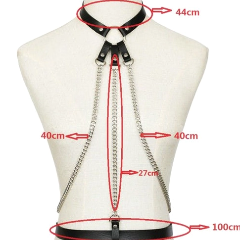 Alternative style body harness leather and chain construction close-up