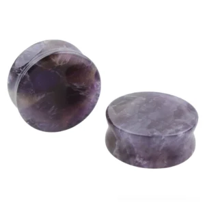Amethyst stone ear gauges and flesh tunnel plugs in multiple sizes showcasing natural purple veining, polished smooth finish, and complete size range from 6mm to 25mm diameter for gothic ear stretching