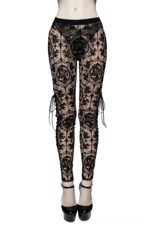 Apricot sheer mesh gothic leggings front view with vintage black floral cross print and side lace-up design on female model