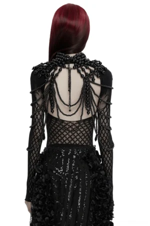 Gothic backless body chain harness rear view showing layered beaded pearls with fishnet sleeve details