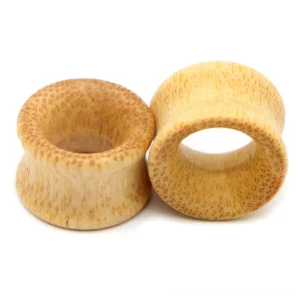 Yellow bamboo ear gauges in multiple sizes 14mm-30mm displayed flat - complete sizing range for stretched ear lobes and gothic body jewelry