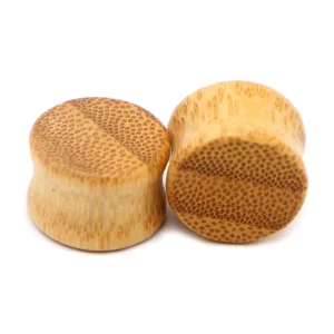 Yellow bamboo wood ear gauges and flesh tunnels in multiple sizes 14mm to 30mm - complete size range display for gothic body jewelry