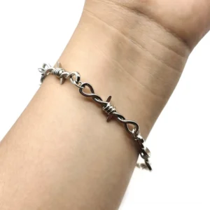 Barbed wire gothic bracelet twisted metal links side view on wrist
