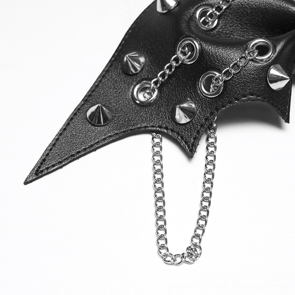 Macro side close-up of black leather bat clip with silver spikes, rivets, and hanging chain elements