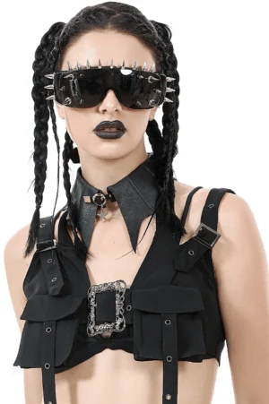 Black bat wing gothic choker with star charm worn by model with braids, front close-up studio shot