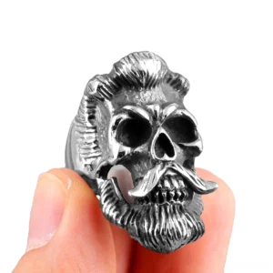 Gothic stainless steel skull ring with bearded gentleman design shown in side profile on model finger