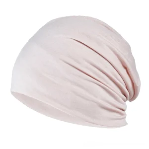 Beige cream gothic slouch beanie with textured ruching, alternative fashion accessory, side profile