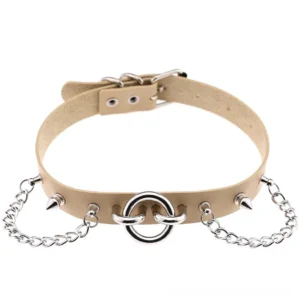 Beige PU leather spiked chain choker with silver metal hardware and adjustable buckle - top-down still life photography