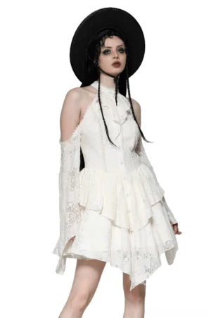 Beige gothic Victorian lace dress with off-shoulder halter neckline and tiered bell sleeves, worn with black hat on model - front three-quarter view