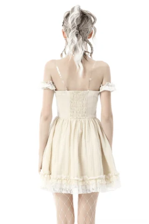 Beige gothic off-shoulder lace dress - back view showcasing shirred bodice and ruffled lace hem with fishnet stockings styling