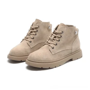 Beige khaki suede gothic ankle boots front three-quarter view with platform sole and button detail