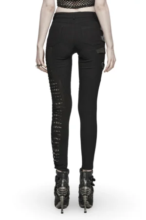 Black gothic asymmetric pants rear view displaying high-waisted cut and side mesh cutout panels