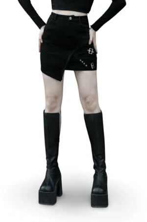 Black asymmetrical buckle denim mini skirt front view worn by model - gothic punk style