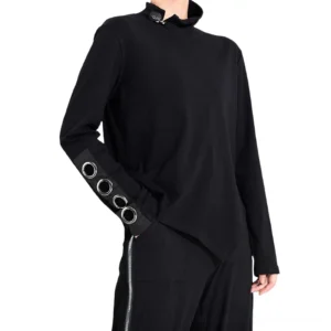 Women's black asymmetrical gothic top with stand collar zipper and metal grommet cuffs, three-quarter left side view on model