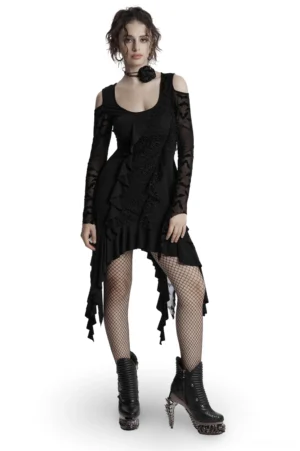 Front three-quarter view of black bat mesh cold-shoulder gothic dress with asymmetrical ruffled hem, sheer mesh sleeves featuring bat print, worn with fishnet stockings on model