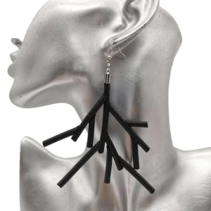 Black branch drop earrings on silver mannequin ear, showcasing matte finish and geometric stick design from side angle