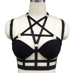 Black gothic strappy cage body harness with pentagram cross straps and metal O-rings, front view on mannequin
