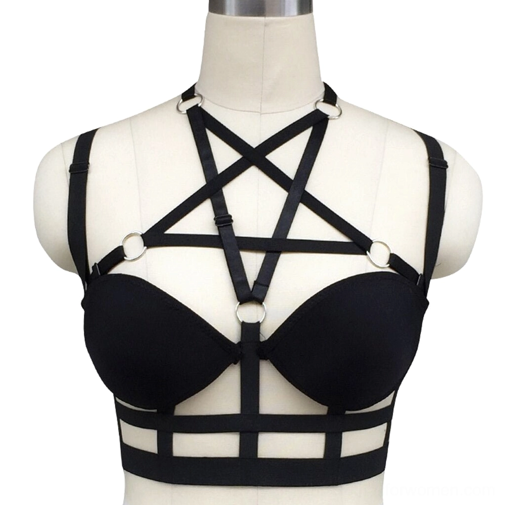 Black gothic strappy cage body harness with pentagram cross straps and metal O-rings, front view on mannequin