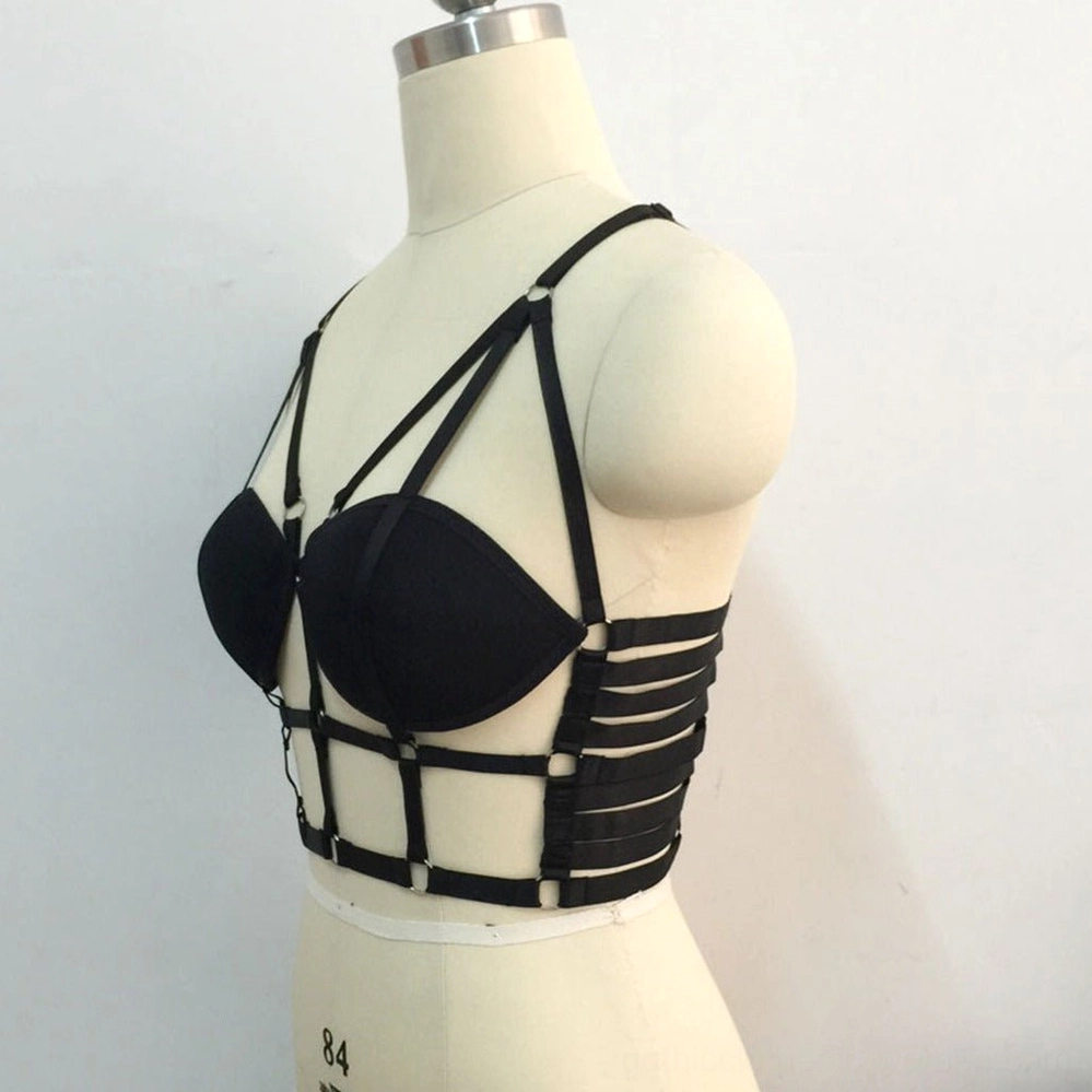 Black cage harness three-quarter side view showing ladder cutout straps and underwire bra cups