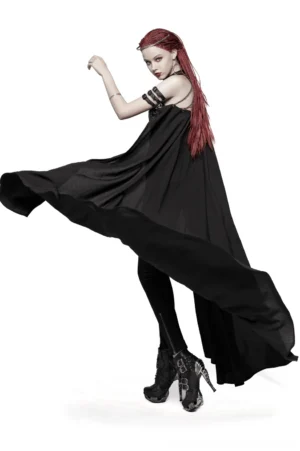 Black chain-linked striped gothic cape with metal buckles, modeled on red-haired woman in studio - side view showing flowing asymmetrical silhouette
