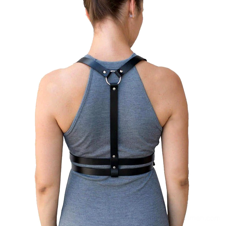 Black leather body harness for women, back view showing metal O-ring connecting shoulder straps, Gothic aesthetic, rear silhouette