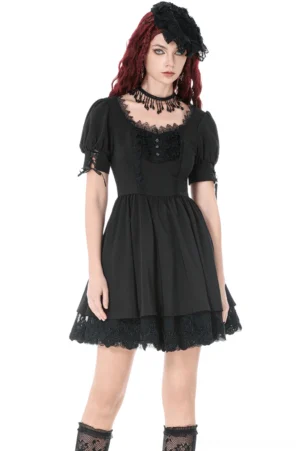 Black lace-up corset gothic dress front view with puff sleeves and ruffled hem on model