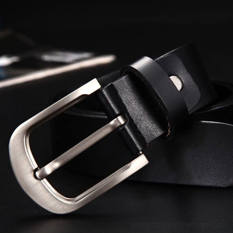 Black genuine leather gothic belt with wide silver pin buckle, 3/4 side view highlighting rivet loop detail and hardware