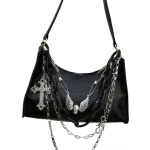 Black crocodile leather gothic handbag featuring ornate cross and skull decoration, shoulder bag style