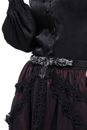Black crystal tassel gothic belt worn on model, side waist view showing elegant crystal and chain embellishment