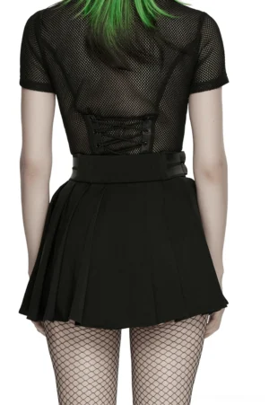 Black cyberpunk pleated mini skirt back view showing elastic waistband and flowing chiffon pleats, styled with mesh top and fishnet tights