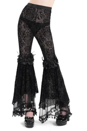 Black velvet damask gothic flare pants front three-quarter view with lace ruffles and feather-trimmed cuffs on female model