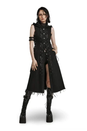 Black denim hooded gothic cape with safety pin details, front three-quarter view on female model wearing alternative fashion