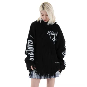 Black distressed oversized turtleneck sweater front view on model - gothic streetwear with white letter print