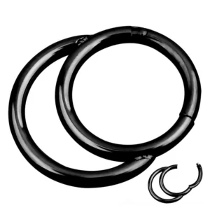 Black stainless steel hinged nose hoop clicker with segment design - flat lay product showcase