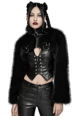 Black faux fur cropped gothic jacket with patent leather front and metal rivets, worn by female model in front three-quarter view with stand collar and zipper closure clearly visible