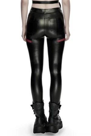 Cyberpunk black leather leggings with red mesh panels and metal accents - rear lower body view