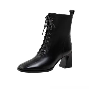 Black square toe lace-up gothic ankle boots with chunky block heel, front three-quarter view on white studio background