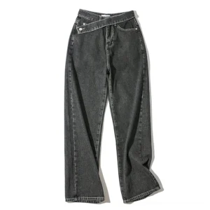 Black asymmetric waistband gothic wide-leg denim jeans flat lay front view with metal snap button detail