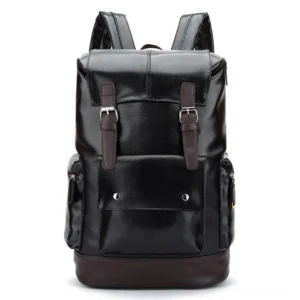 Black gothic leather backpack front view with brown leather trim and dual front buckle straps