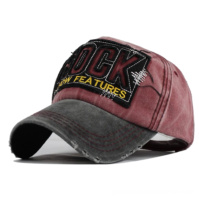 Black gothic baseball cap side three-quarter view with embroidered ROCK patch and distressed details