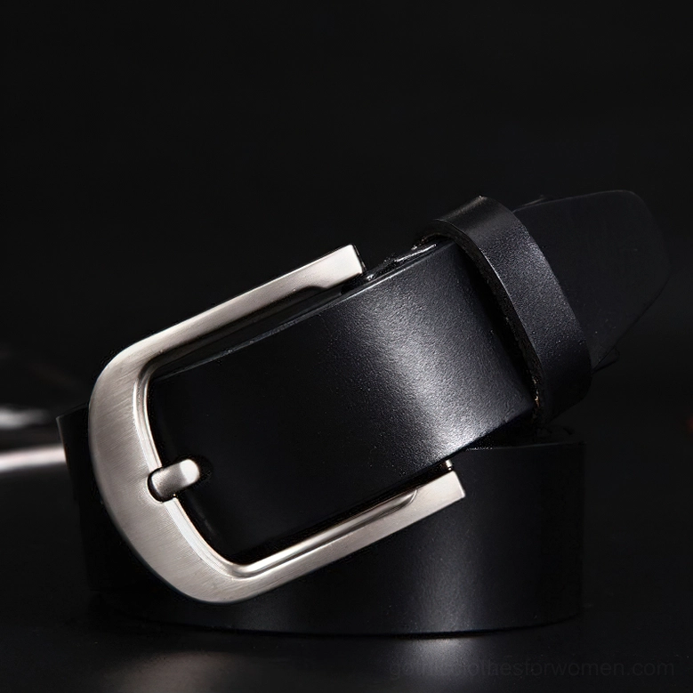 Black matte cowskin gothic belt with metal buckle on dark background, side front view emphasizing leather texture