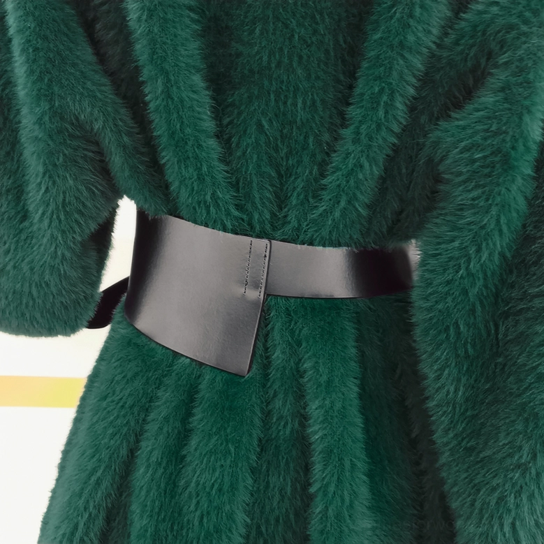 Pure black gothic waist belt simple silver round buckle design front view on green fuzzy garment