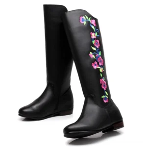 Black embroidered mid-calf gothic boots with colorful floral design, side view showing zipper closure and ornate details