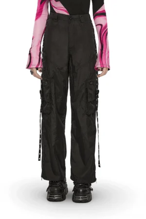 Black gothic cargo pants with side chains worn by model, front full body view showing eyelet straps and zipper details