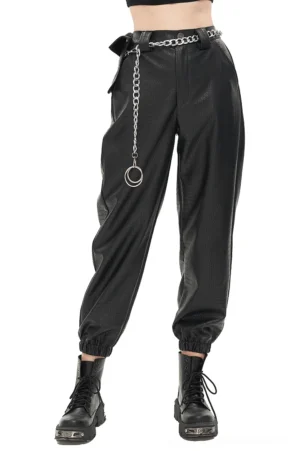 Black PU leather gothic cargo pants front three-quarter view with metal chain waist detail and crocodile texture