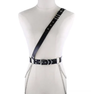 Black gothic chain harness belt with silver metal buckles and hanging chains, front view on mannequin