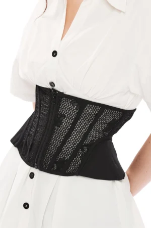 Black mesh cincher corset side profile on model, highlighting fitted waist construction and delicate fishnet mesh upper panels with floral embroidery