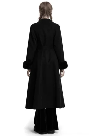 Back view of black gothic coat featuring A-line flowing hem, detachable fur cuffs, and intricate embroidered details